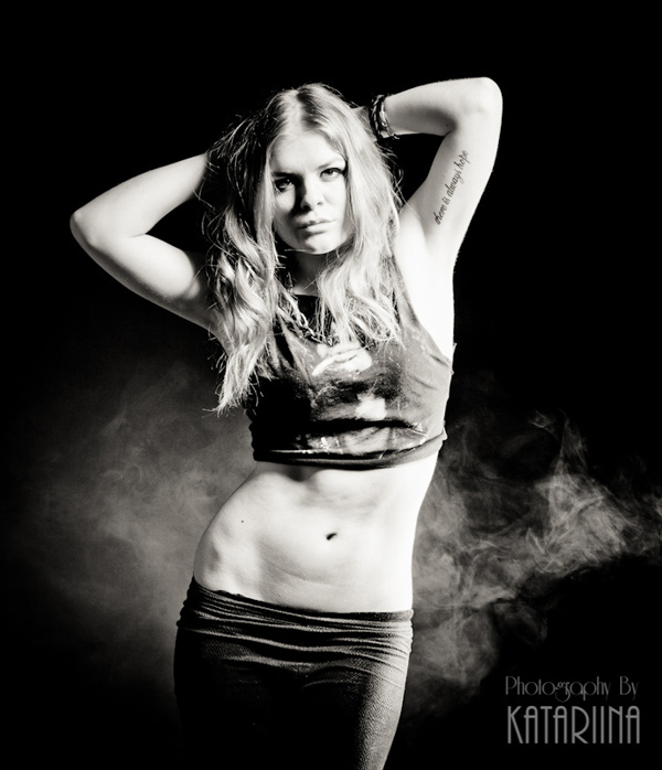 20120203171340 beautiful young model studio portrait with smoke